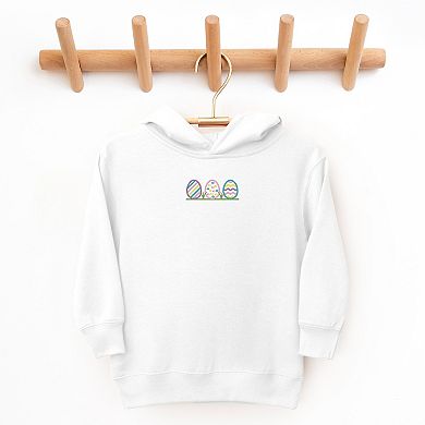 The Juniper Shop Embroidered Easter Eggs In Grass Toddler Hoodie