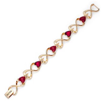 Napier Gold Tone Stretch Bracelet with Heart Design