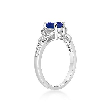 Gemminded 10k White Gold Oval Sapphire & 1/5 Carat T.W. Diamond Crossover Ring