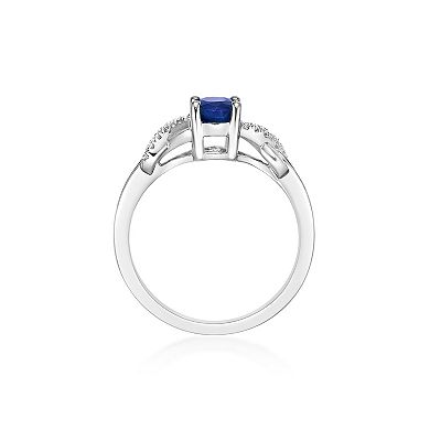 Gemminded 10k White Gold Oval Sapphire & 1/5 Carat T.W. Diamond Crossover Ring