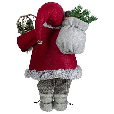 Northlight Standing Santa Figure with Snow Shoes & Presents Floor Decor