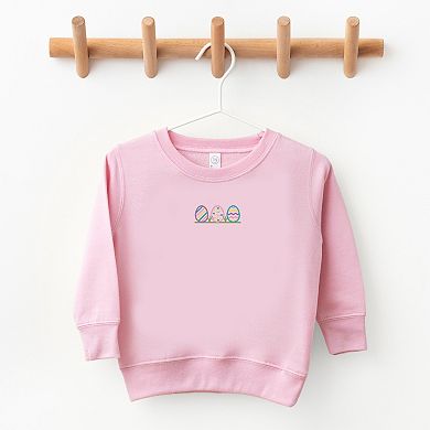 The Juniper Shop Embroidered Easter Eggs In Grass Toddler Sweatshirt