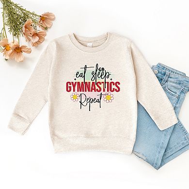 The Juniper Shop Eat Sleep Gymnastics Repeat Toddler Sweatshirt