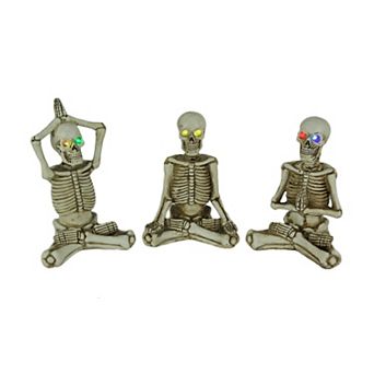Bone Stretchers Yoga Skeleton Figurines with Color Changing LED Eyes Set of 3