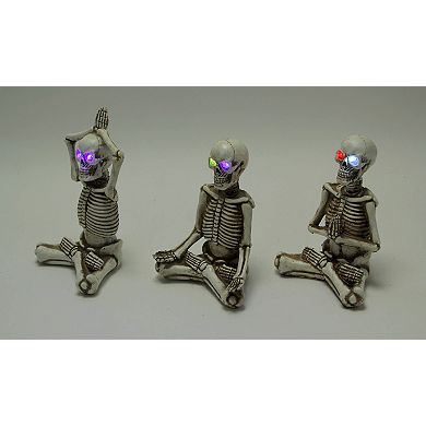 Bone Stretchers Yoga Skeleton Figurines with Color Changing LED Eyes Set of 3