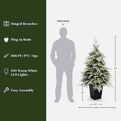 LuxenHome 4.4Ft Pre-Lit Green Branches Lightly Flocked Artificial Christmas Tree Potted