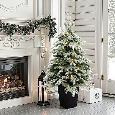 LuxenHome 4.4Ft Pre-Lit Green Branches Lightly Flocked Artificial Christmas Tree Potted