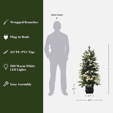 LuxenHome 4Ft Pre-Lit Green and Flocked Artificial Christmas Tree in Black Planter Pot