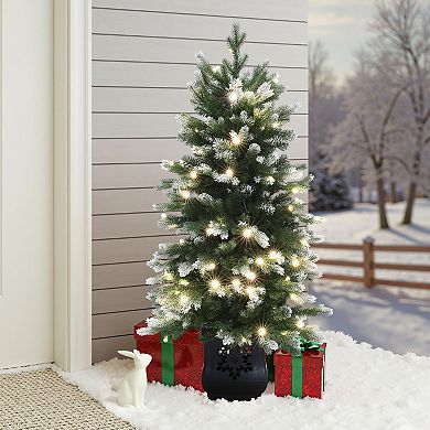 LuxenHome 4Ft Pre-Lit Green and Flocked Artificial Christmas Tree in Black Planter Pot