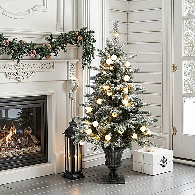 LuxenHome 4Ft Pre-Lit Snow-Flocked Artificial Christmas Tree in Brushed Silver Urn Pot