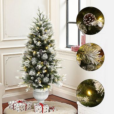 LuxenHome 4.5Ft Pre-Lit Green Artificial Christmas Tree with Light Faux Snow and White Pot