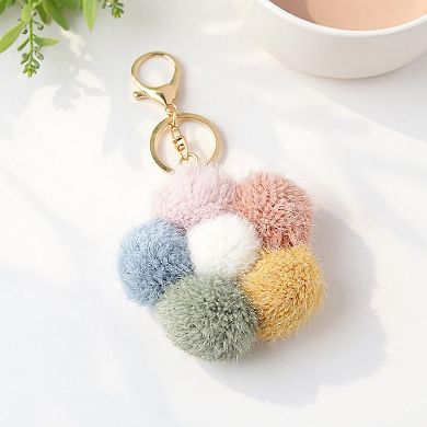 Multicolor Pom Pom Keychain with Gold Flower Charm and Smiley Accent
