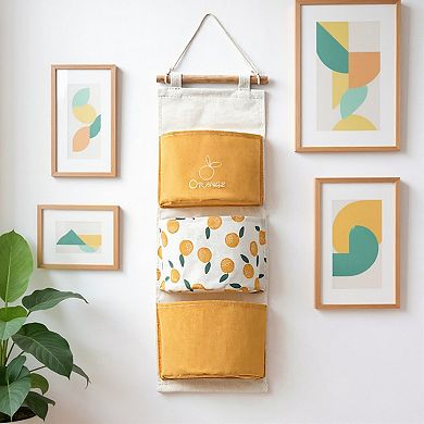 Hanging Wall Storage Organizer with Multiple Fabric Pockets and Orange Fruit Print Design