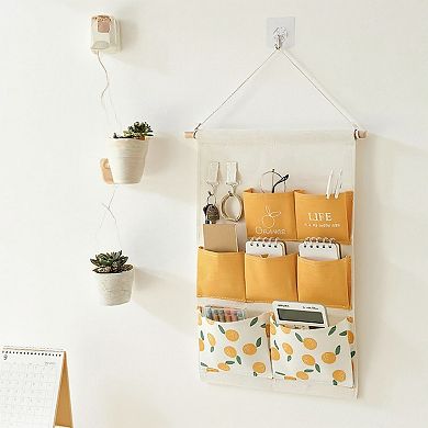 Hanging Wall Storage Organizer with Multiple Fabric Pockets and Orange Fruit Print Design