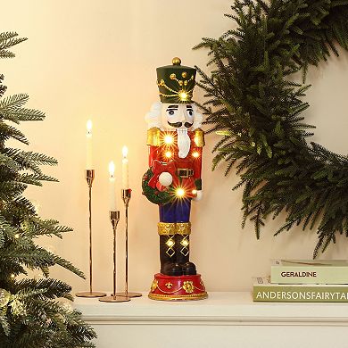 LuxenHome 2Ft Lighted Nutcracker Red Soldier with Wreath, Battery Operated Christmas Decoration