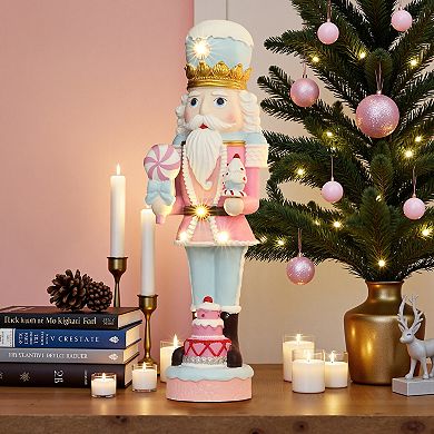 LuxenHome 2Ft Lighted Nutcracker Pink Soldier with Cake, Battery Operated Holiday Decoration