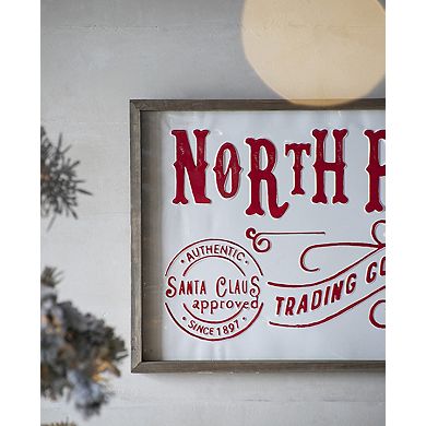 LOVMOR 26x18 Inch Iron/Wood North Pole Trading Company Christmas Wall Sign