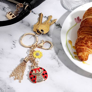 Juicy Couture Ladybug Crystal Keychain In Gold Tone With Sunflower Charm