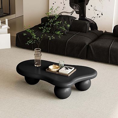 40 Inch Cloud Shaped Coffee Table with Three Ball Legs
