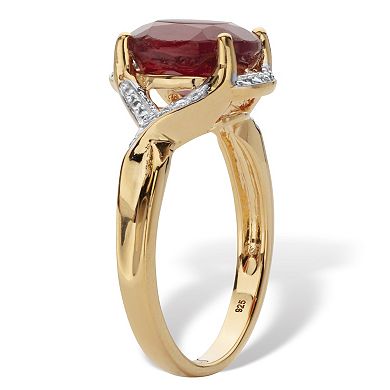 PalmBeach Jewelry 3.15 Cttw. Oval Cut Red Ruby 14k Gold-Plated Silver Two Tone Halo Ring
