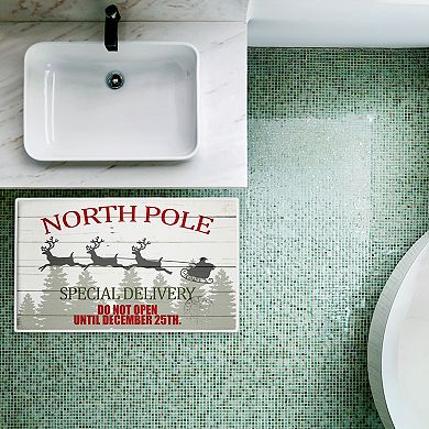 Stupell Home Decor North Pole Special Delivery Holiday Sleigh Bath Mat
