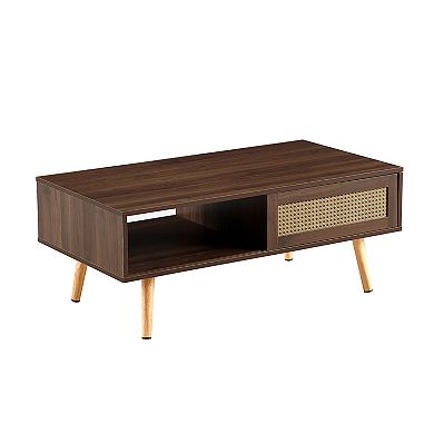 PE Rattan Coffee Table with Sliding Storage Door and Solid Wood Legs for Living Room