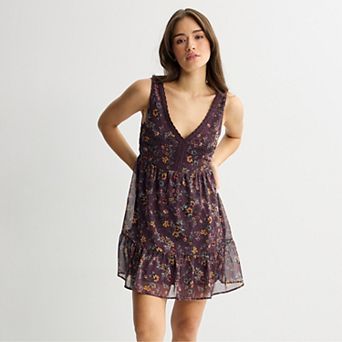 Juniors' Live To Be Spoiled Lace Trim V-Neck Skater Mini Dress