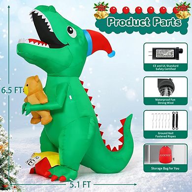 GOOSH 7 FT Christmas Inflatables Dinosaur T Rex with Xmas Hat Holding a Bear with Built-in LEDs