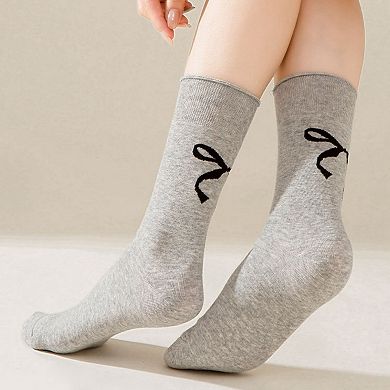 4-Pair Women's Soft Knit Crew Socks with Minimal Logo Detail Stretch Fabric Everyday Comfort Set