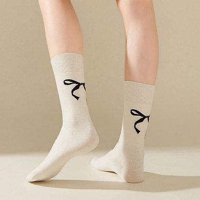 4-Pair Women's Soft Knit Crew Socks with Minimal Logo Detail Stretch Fabric Everyday Comfort Set