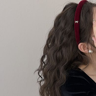 Padded Headband with Soft Velvet Texture and Delicate Bow Accent Detail