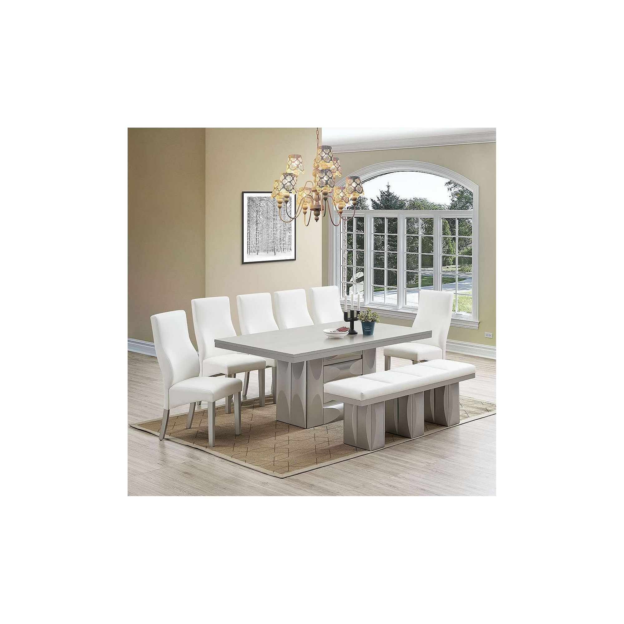 White upholstered parson dining chairs with tapered legs around a table
