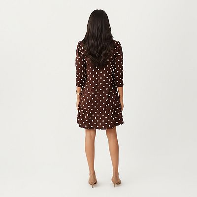 Women's Long Sleeve Polka Dot Mini Dress with Round Neckline and Ruffled  Hem Detail
