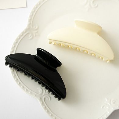 Curved Hair Claw Clip with Smooth Finish and Secure Hold