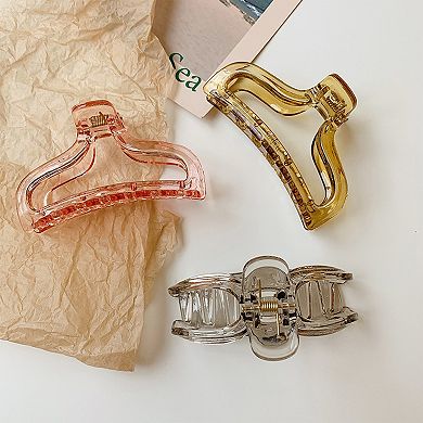 Curved Hair Claw Clip with Sculpted Design and Strong Hold