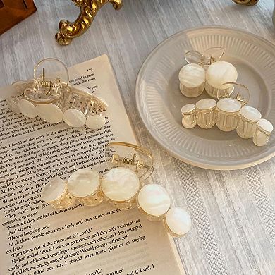 Rounded Disc Hair Claw Clip with Smooth Finish and Secure Spring Hold