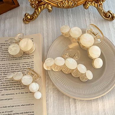 Rounded Disc Hair Claw Clip with Smooth Finish and Secure Spring Hold