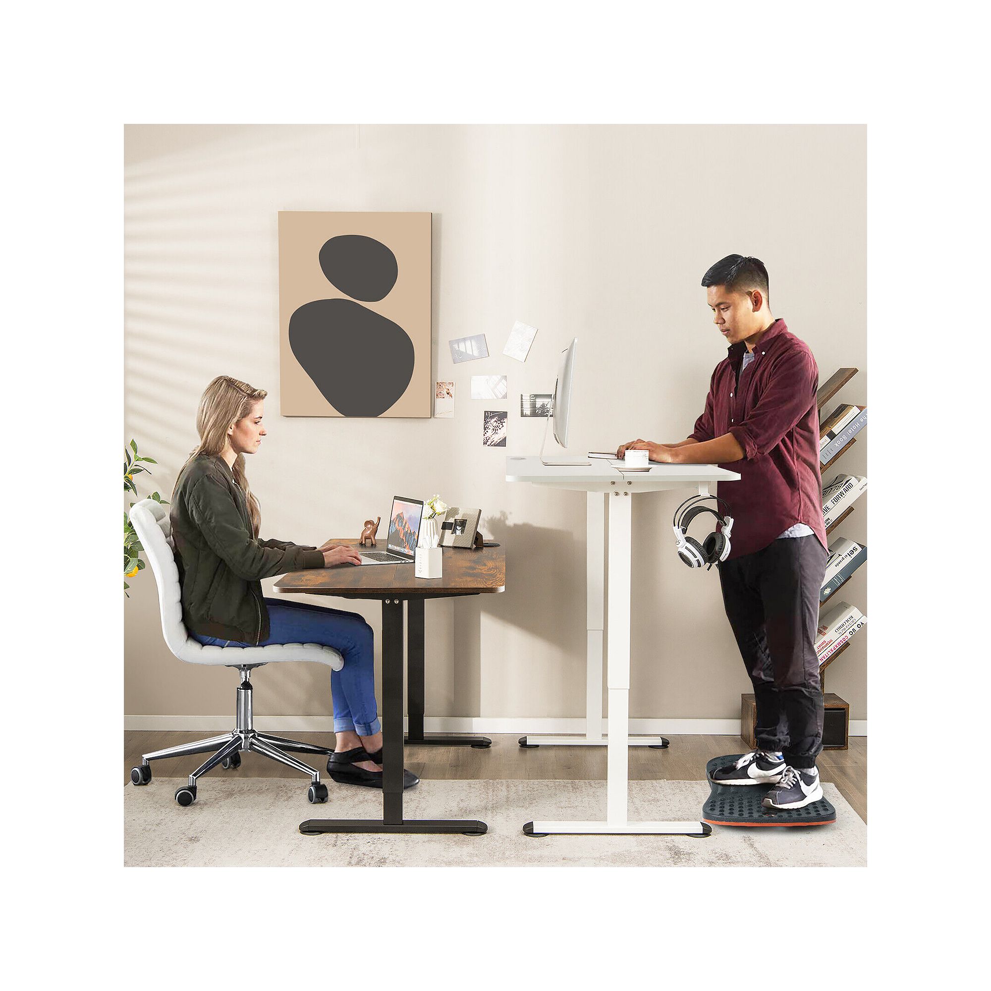 Person using an electric adjustable standing desk while standing