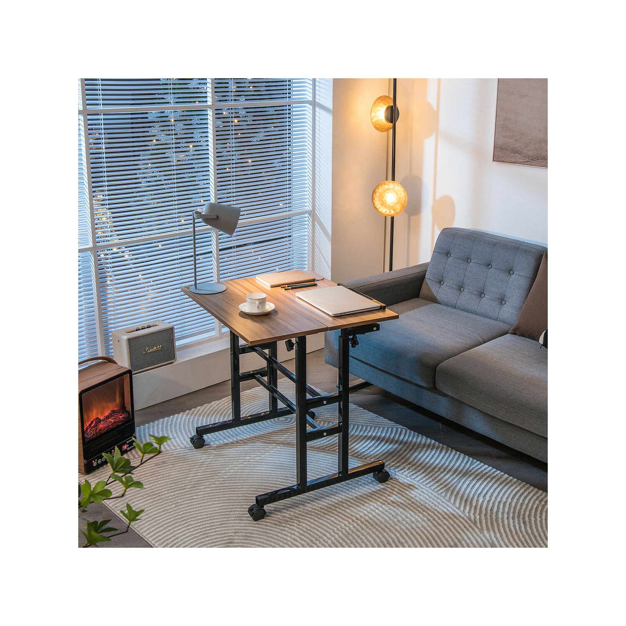 Stand-up tilting adjustable desk placed near a couch