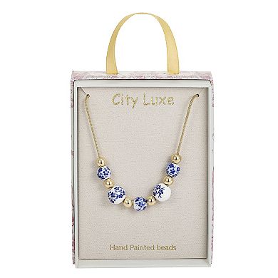 City Luxe Gold Tone Hand Painted Ceramic Blue & Polished Bead Necklace