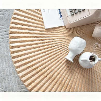 Rustic-style two-piece nesting coffee tables; round tables with wooden radial grain