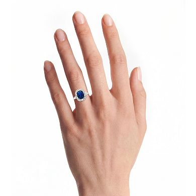PRIMROSE Sterling Silver Simulated Sapphire & Cubic Zirconia Halo Ring