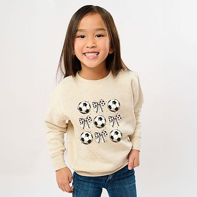 The Juniper Shop Soccer Ball Bows Stacked Youth Sweatshirt