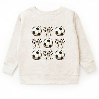 The Juniper Shop Soccer Ball Bows Stacked Youth Sweatshirt