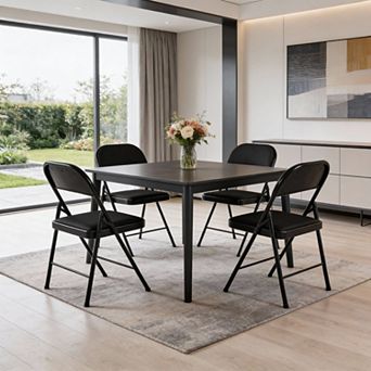 HomeRoots Set of Four Black Faux Leather and Steel Folding Chairs