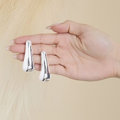 JS Jessica Simpson Sculptural Silver-Tone Drop Earrings for Modern Elegance