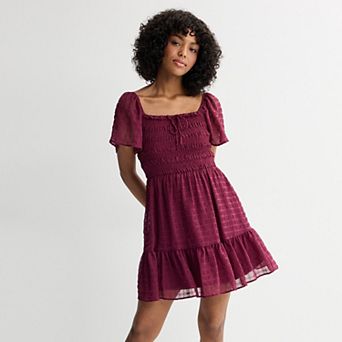Juniors' Rewind Flutter Sleeve Ruffle Tie Neck Skater Dress