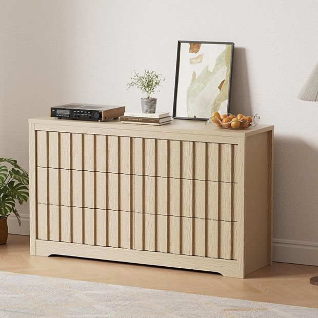 modern fluted dresser KeyWhat for Bedroom, Wooden 6 Drawer Dresser, Storage Cabinet Chest of Drawers for Living Room, Solid White TextureFluted textures and gentle curves come together in a simple Amerlife Cropredy Fluted 6-Drawers Dresser