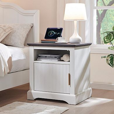Two-piece built-in bedside table with charging station, open shelving and bedside table.