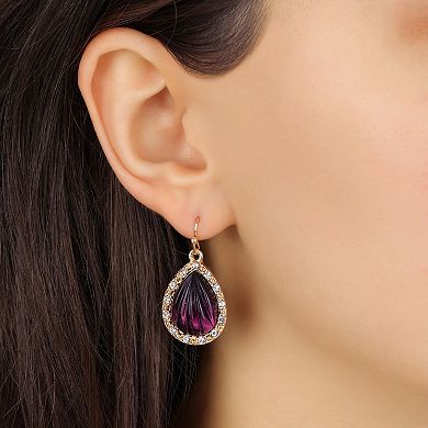 1928 Gold Tone Purple Fluted Teardrop Earrings